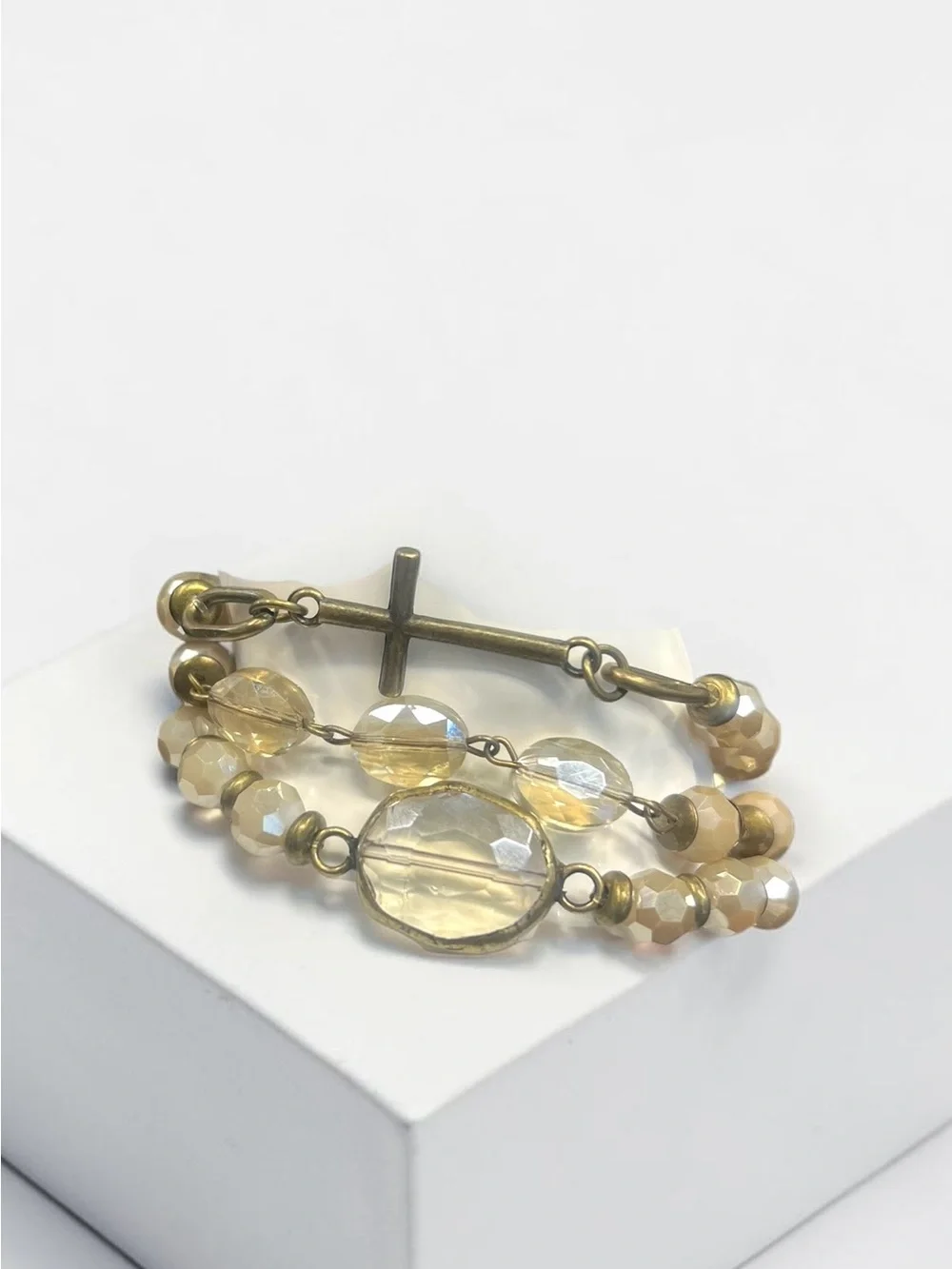 Elegant ivory-champagne Beaded Cross Bracelet